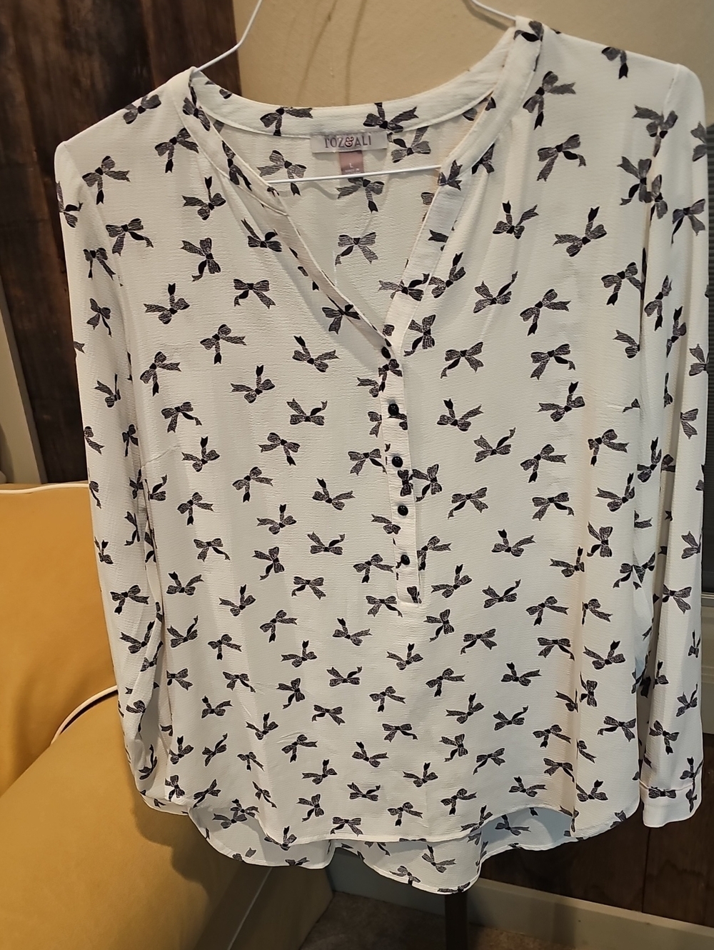 Roz & Ali Cream Blouse with Black Bow Print